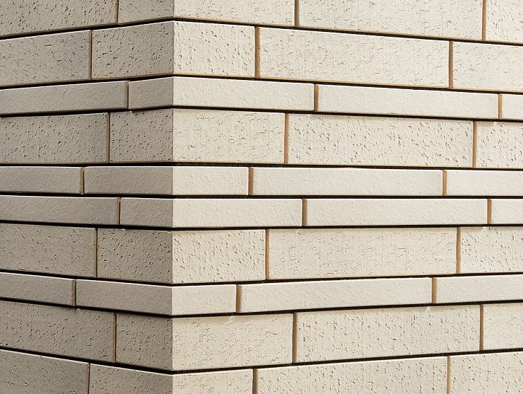 90°曲ネット張り（馬踏目地）（接着）の納まり